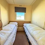 6 Berth Caravan For Hire With Decking At Manor Park In Norfolk Ref 23017S
