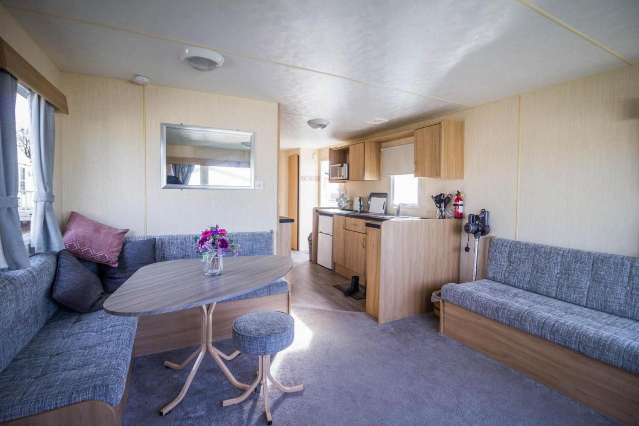 Lovely Caravan With Decking At Manor Park Nearby Beach Ref 23017t Campsite
