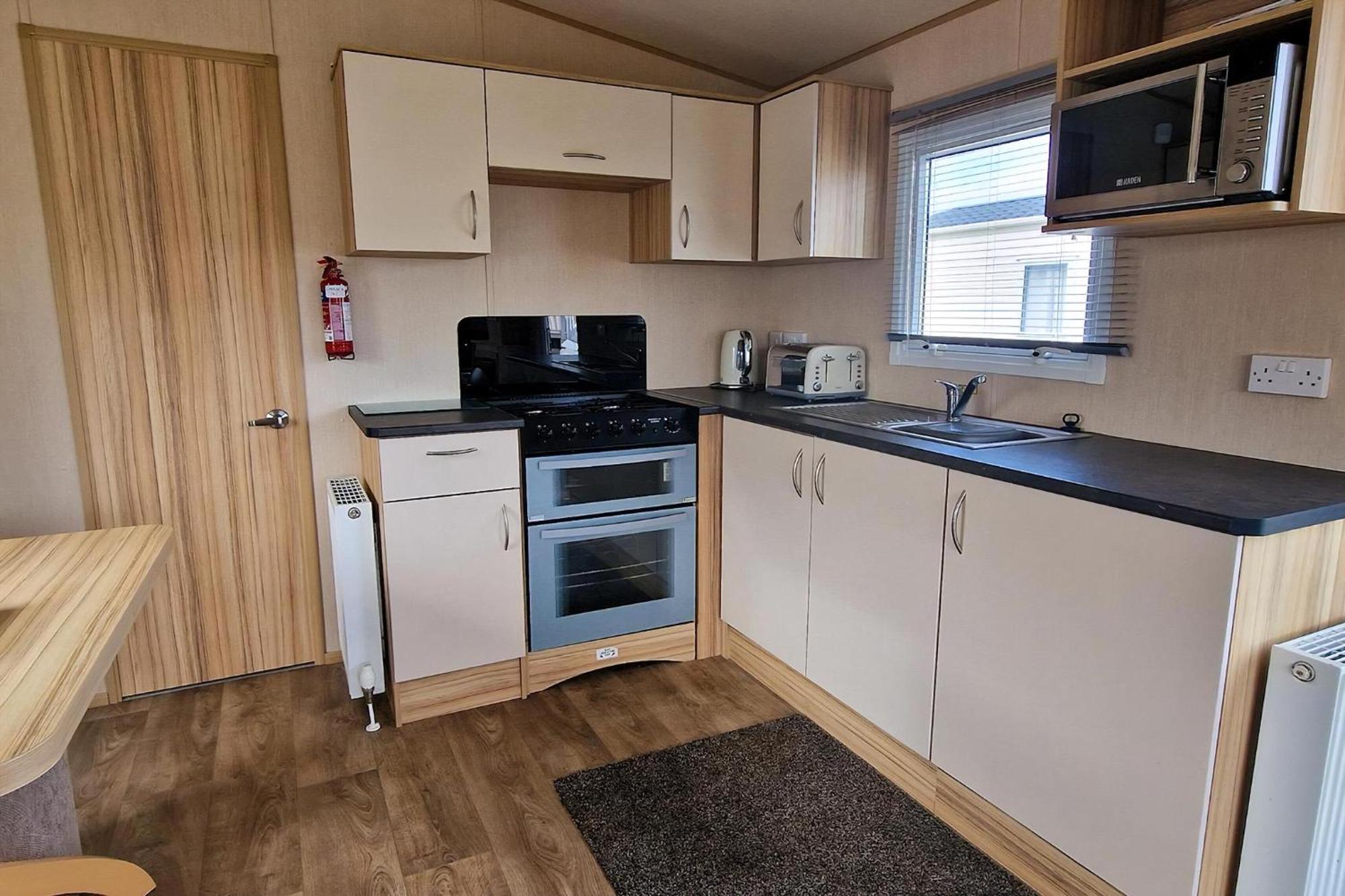 8 Berth Caravan For Hire At Manor Park Near To A Great Ref 23041c Campsite