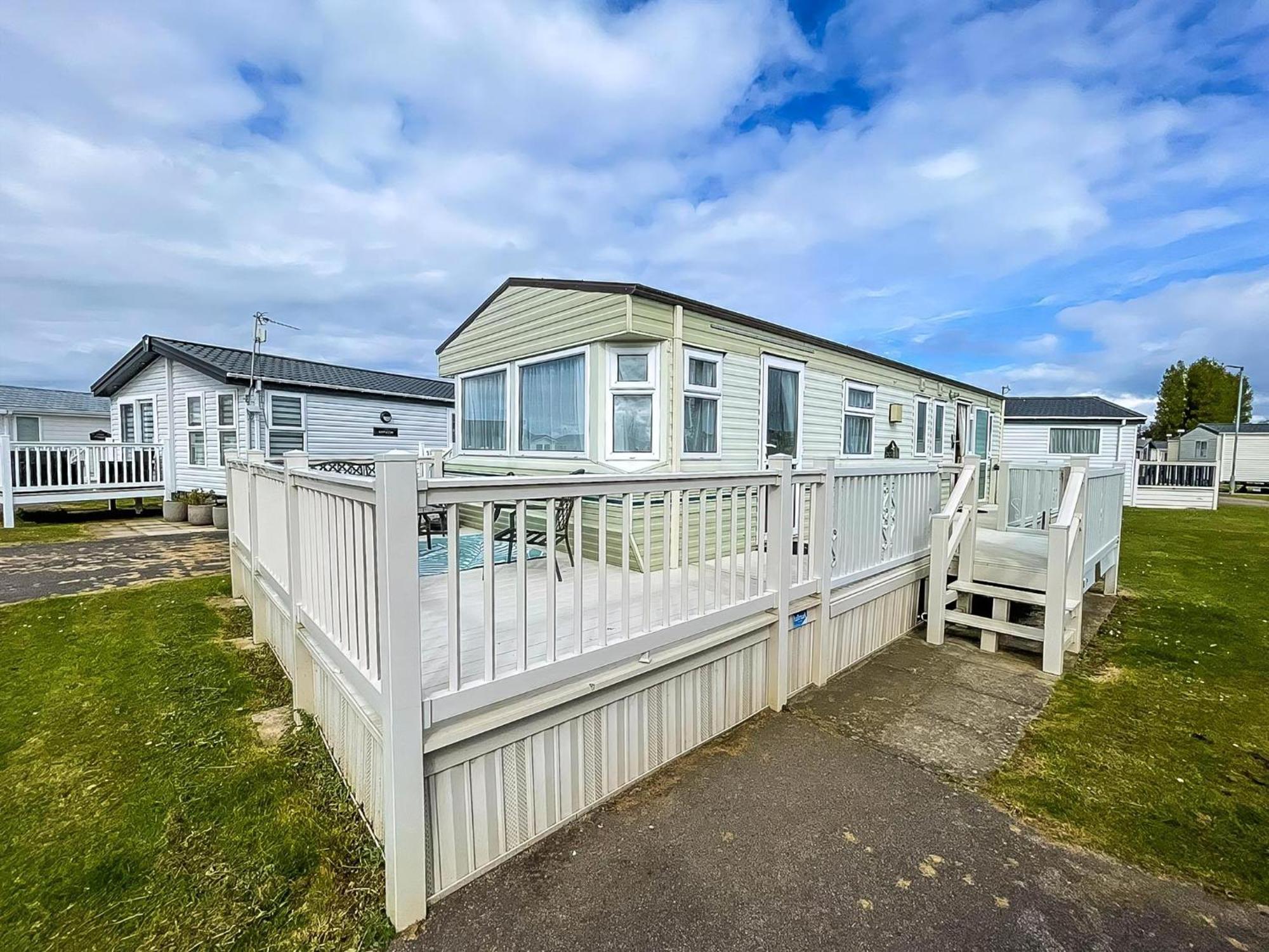 Lovely Caravan For Hire With Large Decking Area In Ref 23218k Campsite *