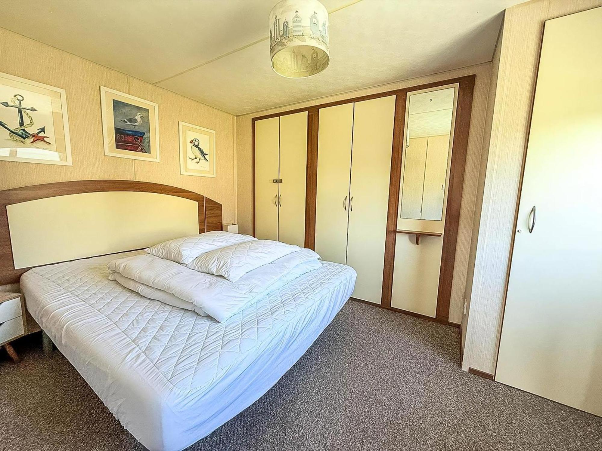 Beautiful 6 Berth Caravan For Hire With Huge Decking At Manor Park Ref 23142k