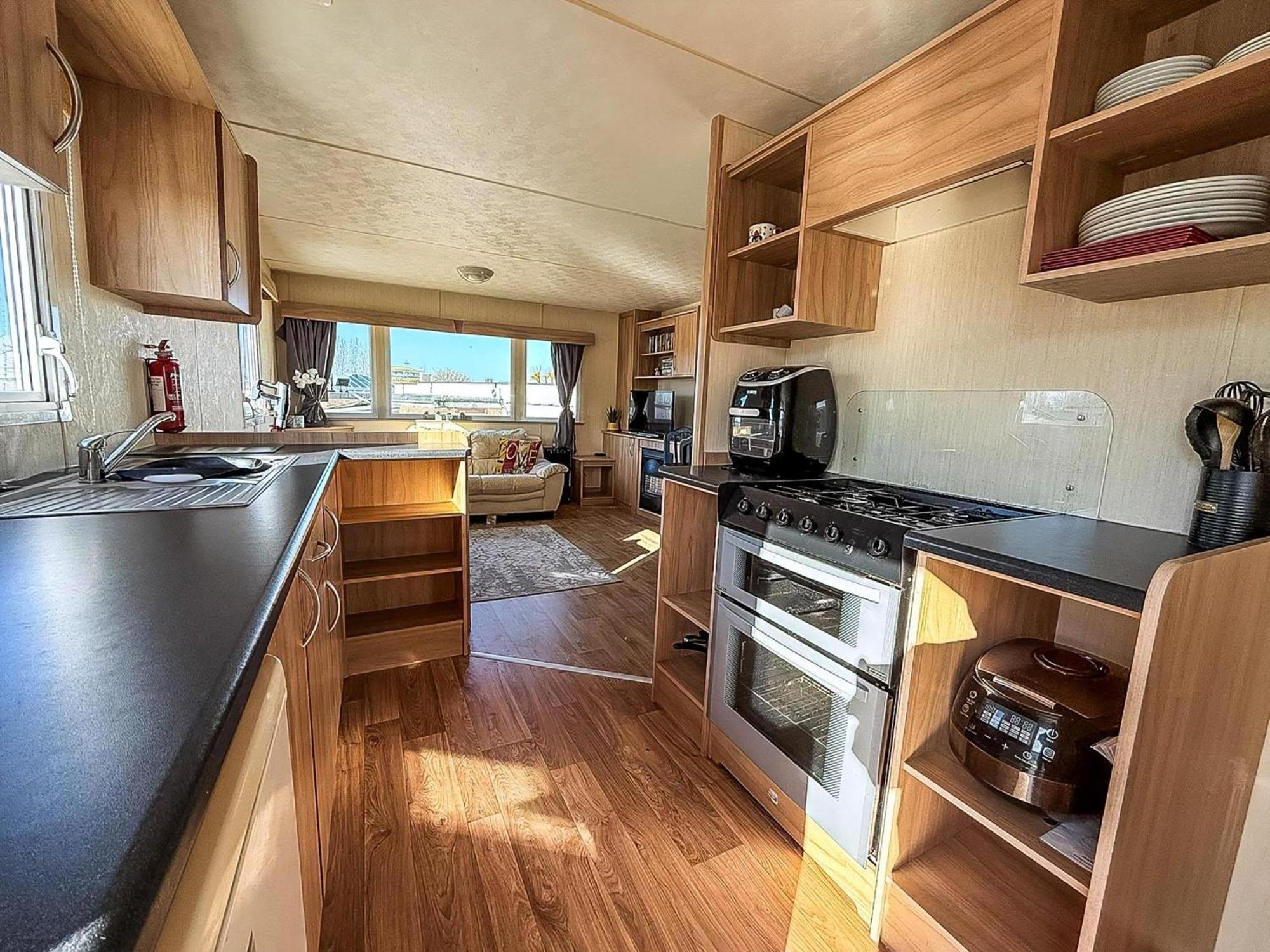 Campsite 6 Berth Caravan For Hire With Decking At Manor Park In Norfolk Ref 23017s