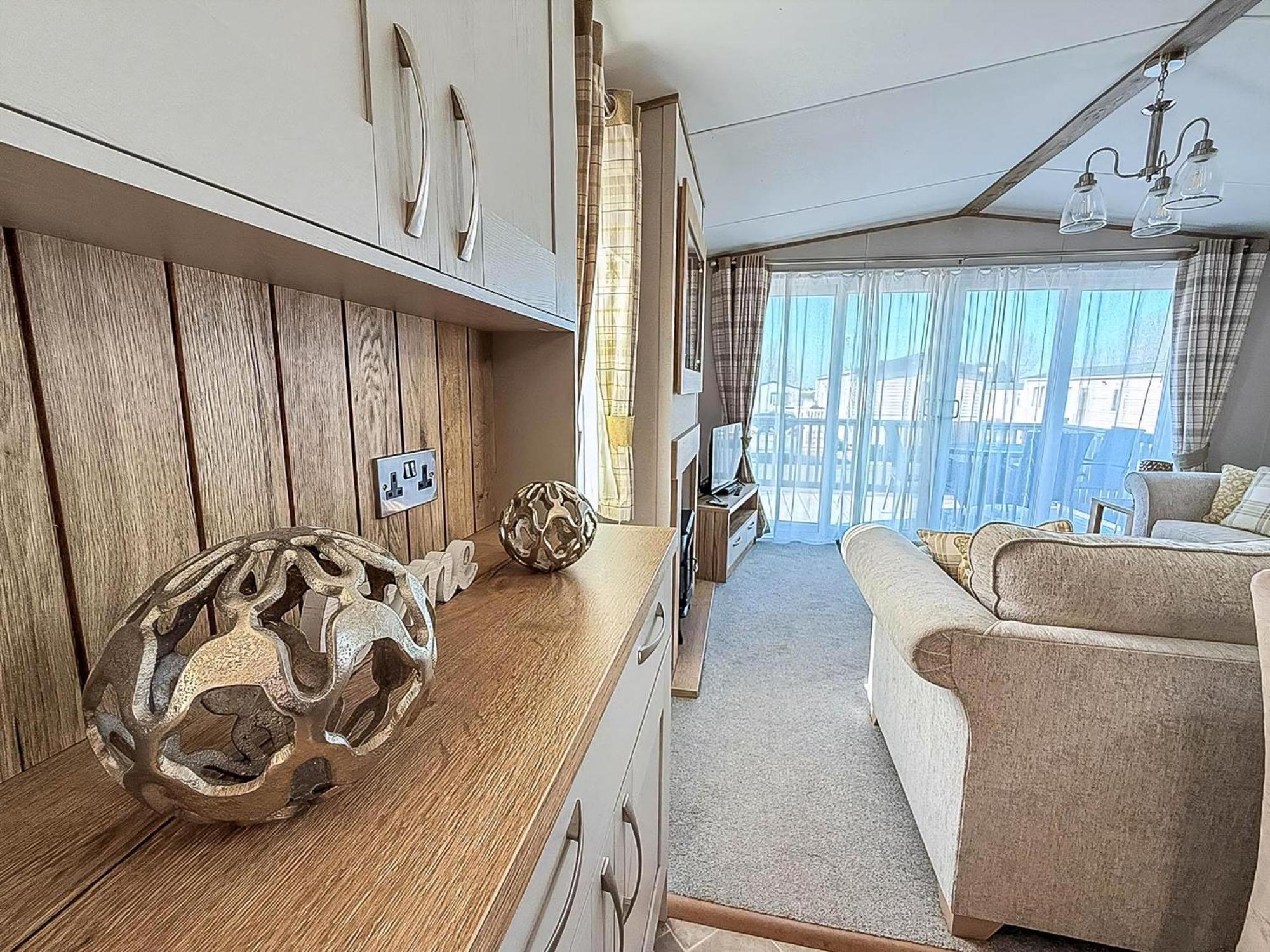 Amazing Caravan With Decking At Manor Park In Ref 23010ha Campsite