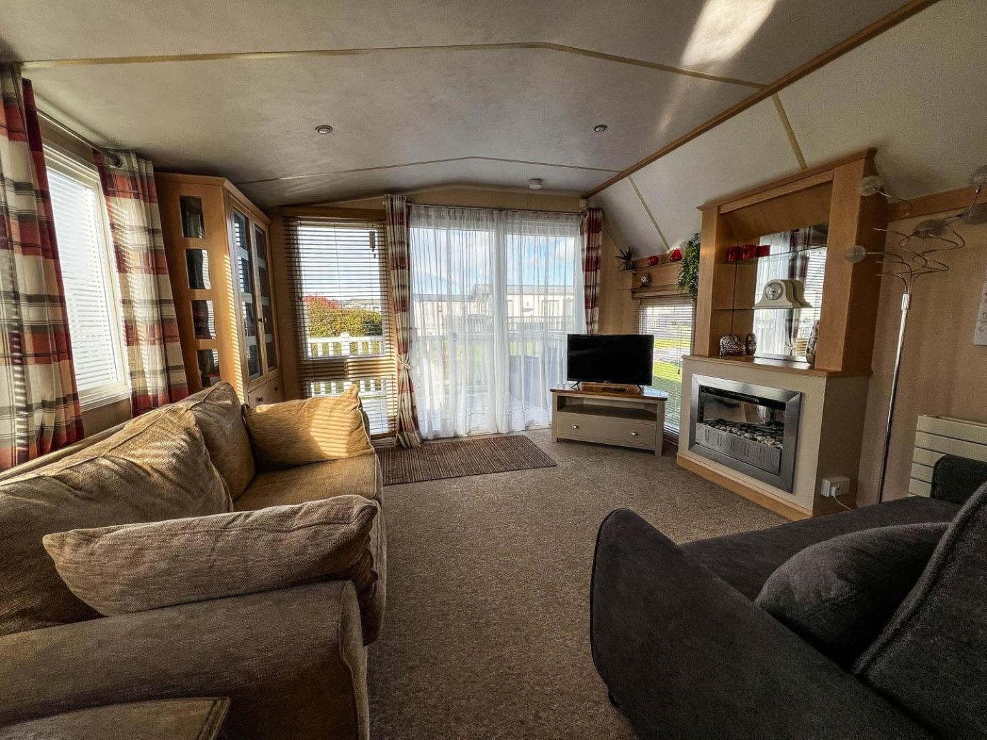 Great Caravan For Hire With Pond Views At Manor Park Holiday Park Ref 23228k Campsite