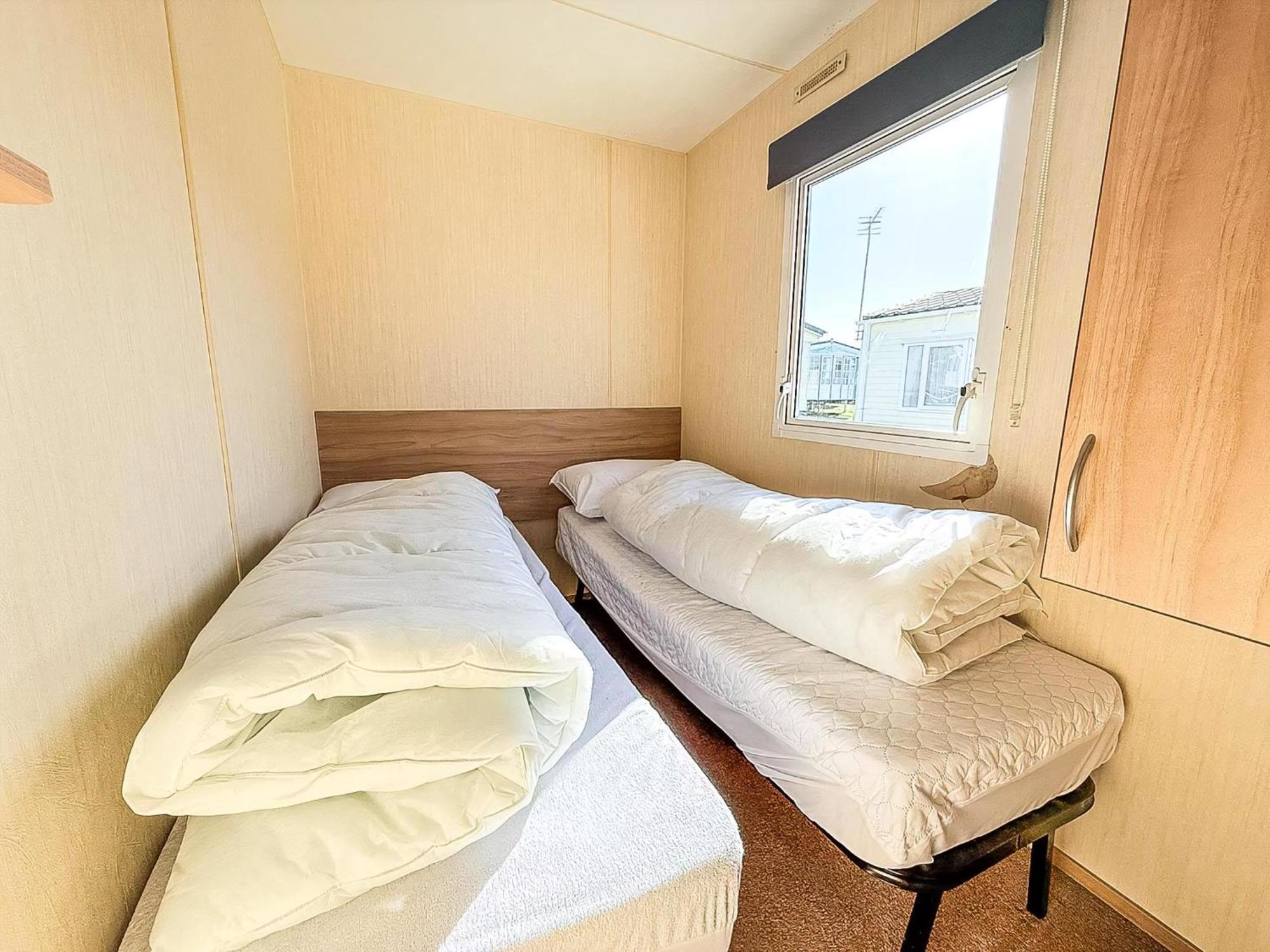 Campsite 6 Berth Caravan For Hire With Decking At Manor Park In Norfolk Ref 23017s