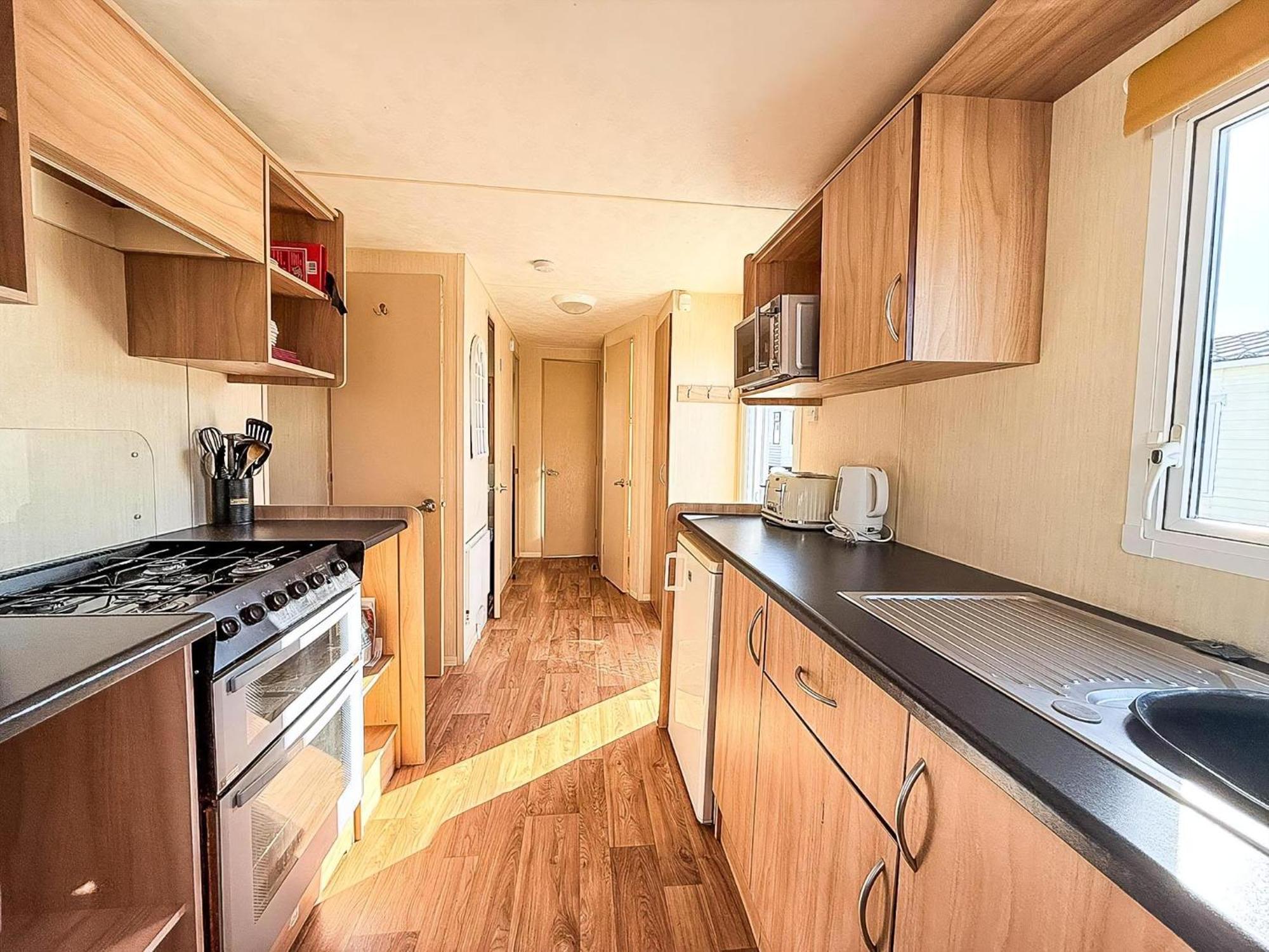 Campsite 6 Berth Caravan For Hire With Decking At Manor Park In Norfolk Ref 23017s Hunstanton